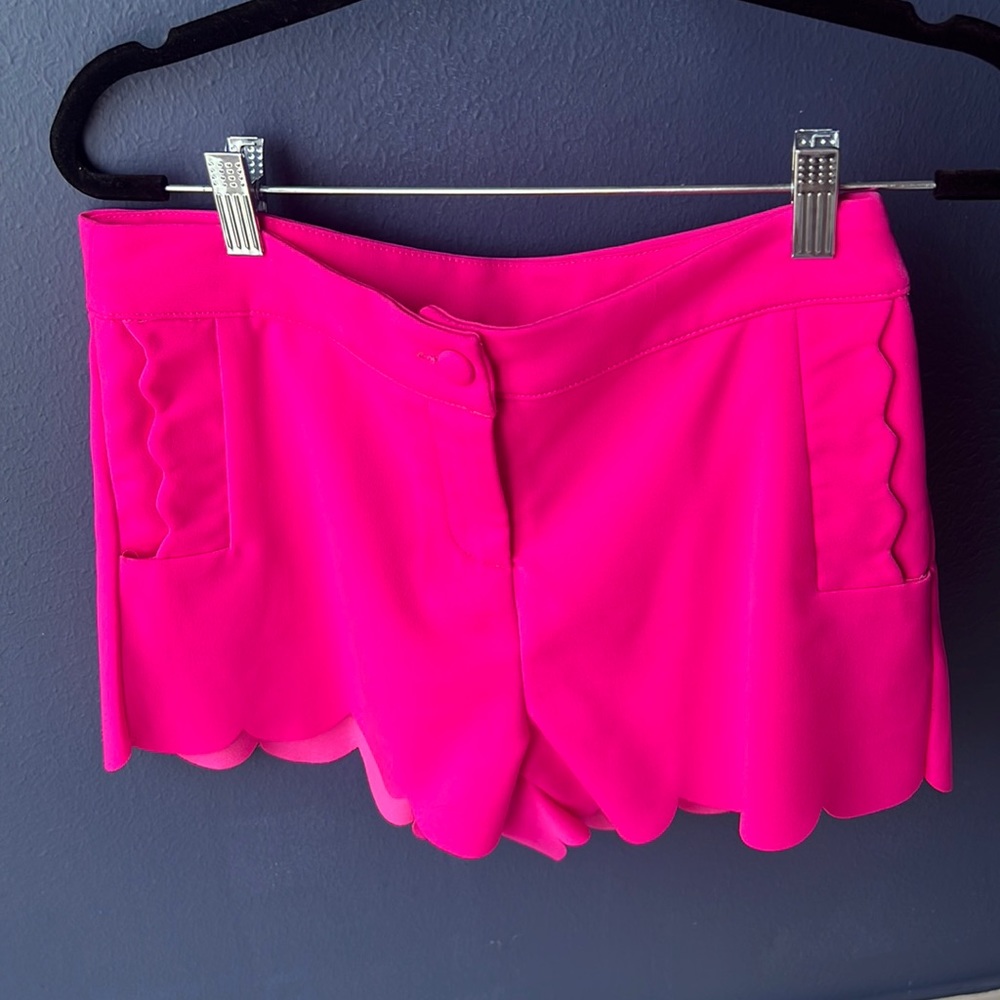 Hot pink shorts with scalloped trim